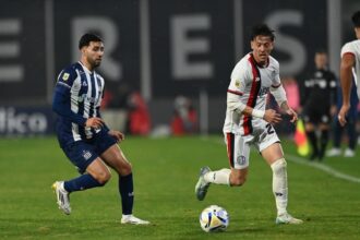 Tripichio en el partido con Talleres
