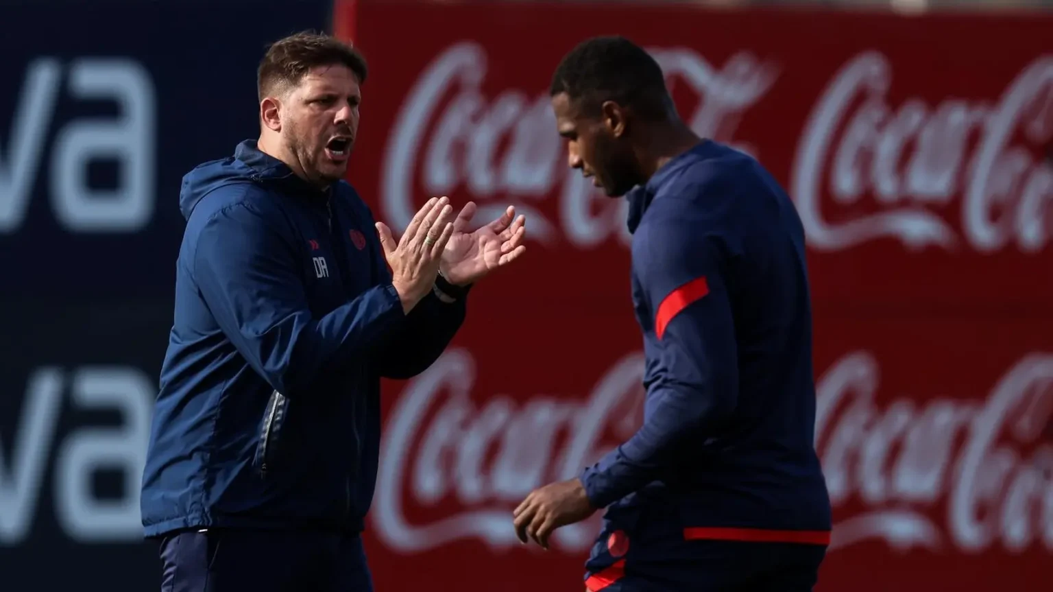 Damián Ayude y Jhohan Romaña en un entrenamiento