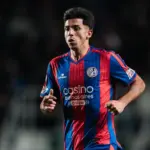 Alexis Cuello en el partido con Independiente